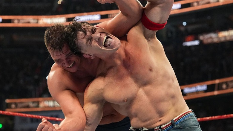 John Cena breaks out of a hold GUNTHER has on him in the middle of the ring during their match at Saturday Night's Main Event.