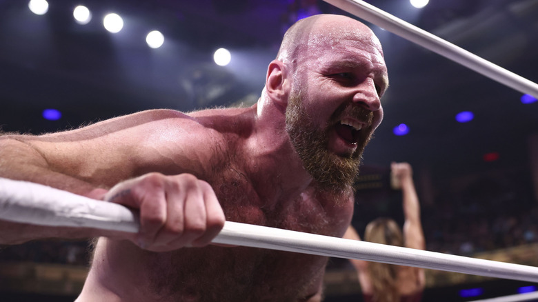 Jon Moxley leans through the ropes to yell at someone outside of the ring during a match on the July 29, 2026 edition of 