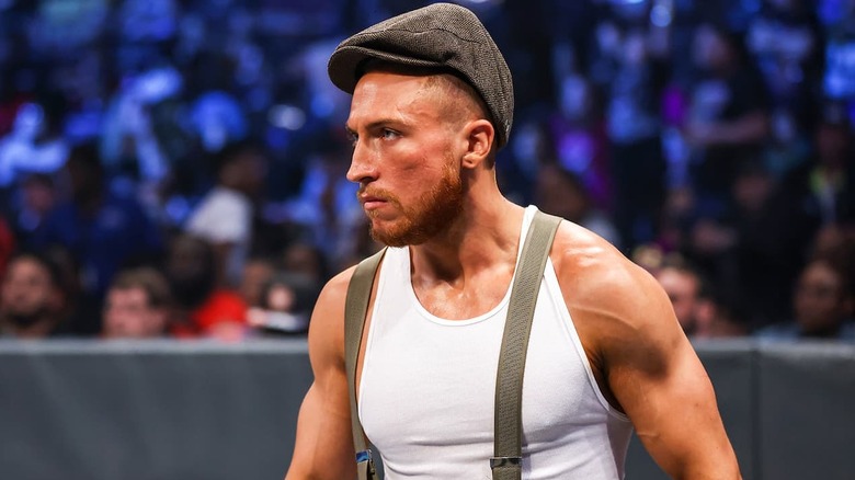 Butch walking, glaring