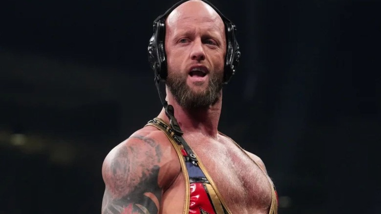 Josh Alexander stands in the ring, ready for a match, on an episode of AEW programming.