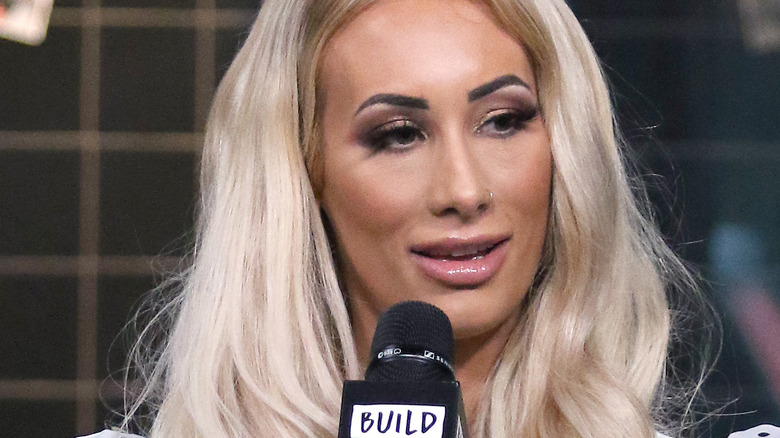 Carmella speaking