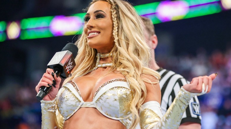 Carmella smiling