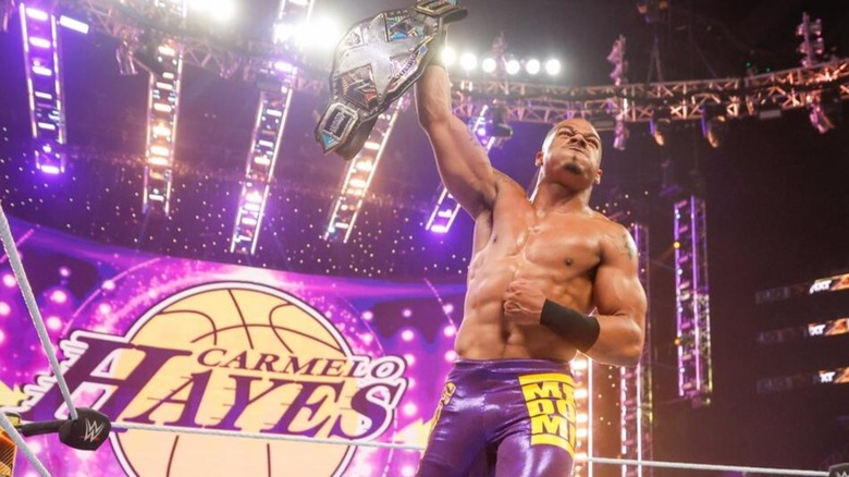 Carmelo Hayes celebrates winning the NXT Men's Championship in 2023