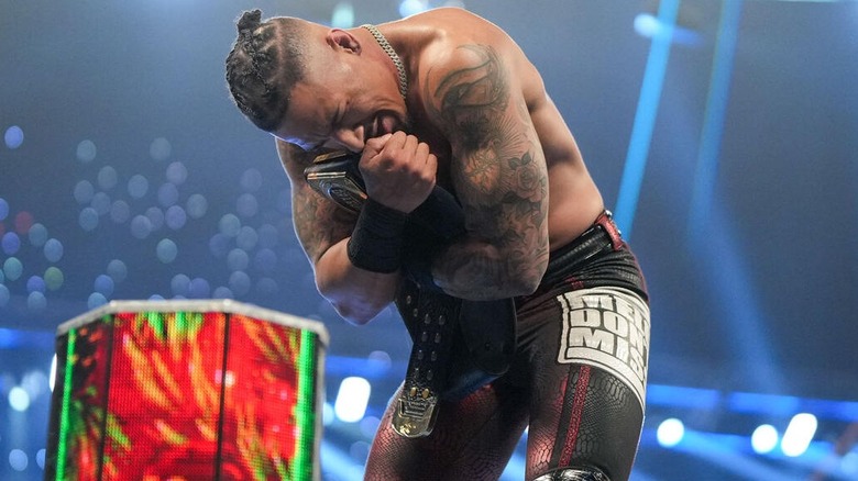 Carmelo Hayes clutches his newly won WWE Men's United States Championship after securing it on "WWE SmackDown"