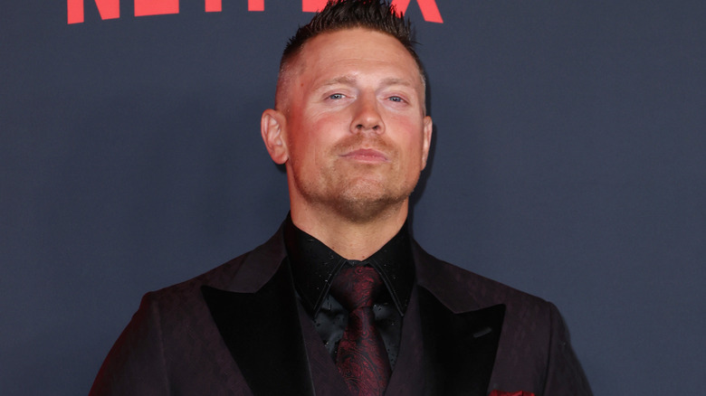 The Miz wearing a suit
