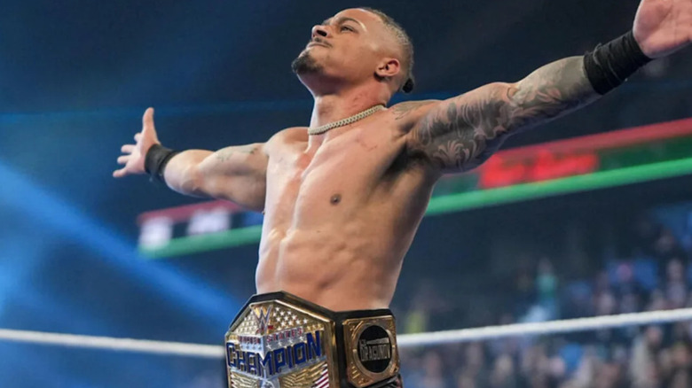 Carmelo Hayes wearing the WWE United States Championship