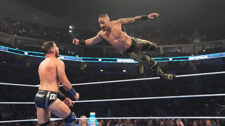 Melo hitting a clothesline on Johnny Gargano