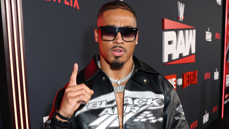 Carmelo Hayes wearing sunglasses