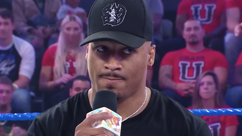 Carmelo Hayes with a microphone