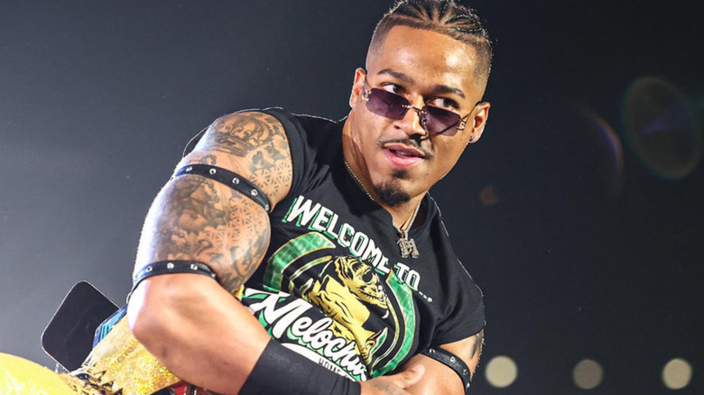 Carmelo Hayes wearing "NXT" Championship