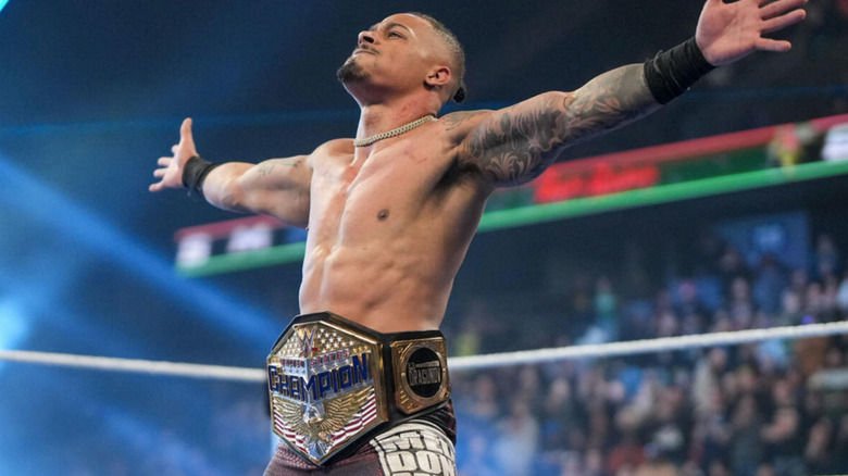 Carmelo Hayes celebrates with the United States Championship