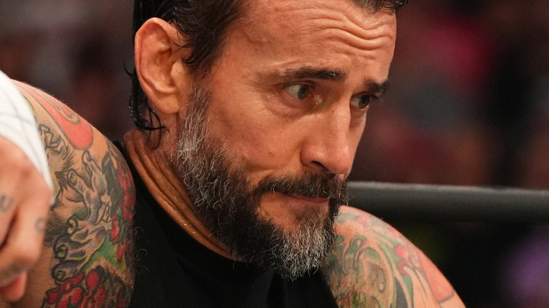 CM Punk enters the ring for his AEW title match at All Out