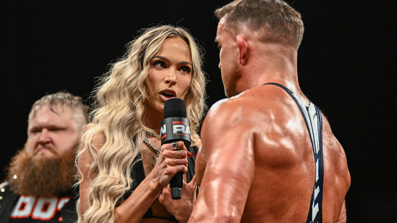 Maxxine Dupri talking to Chad Gable in WWE ring