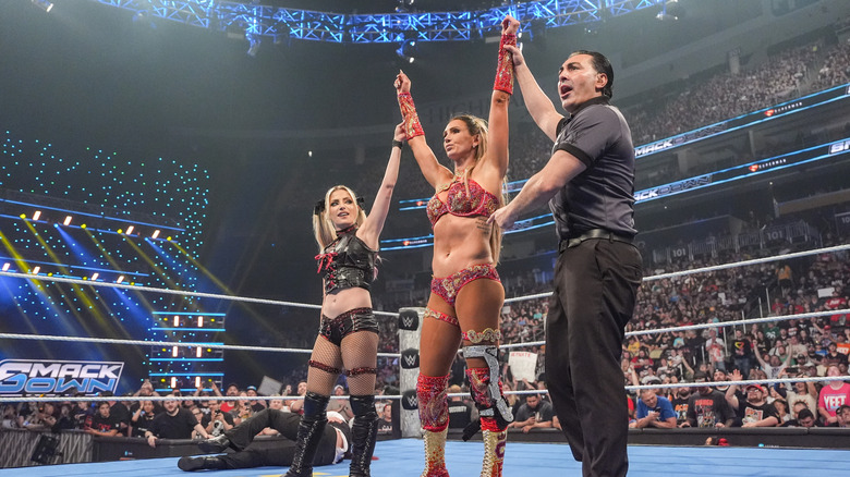 Charlotte Flair and Alexa Bliss celebrate victory