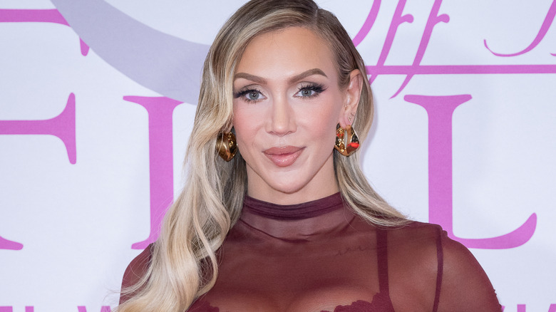 Charlotte Flair wearing dangly earrings