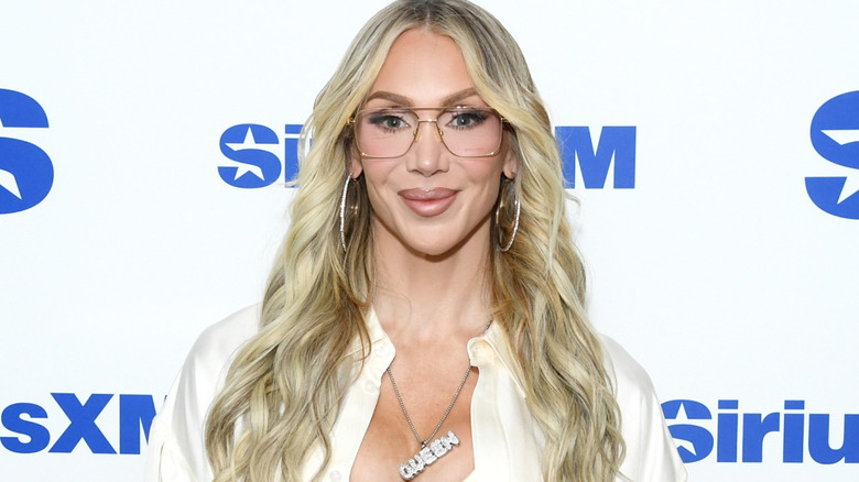 Charlotte Flair wearing glasses