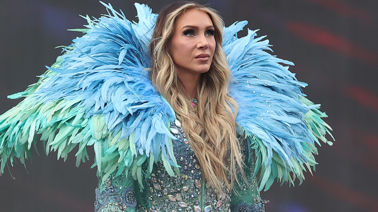 Charlotte Flair wearing a light blue ring robe