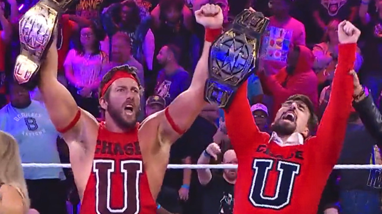 Chase U holding up "NXT" Tag Team Championships
