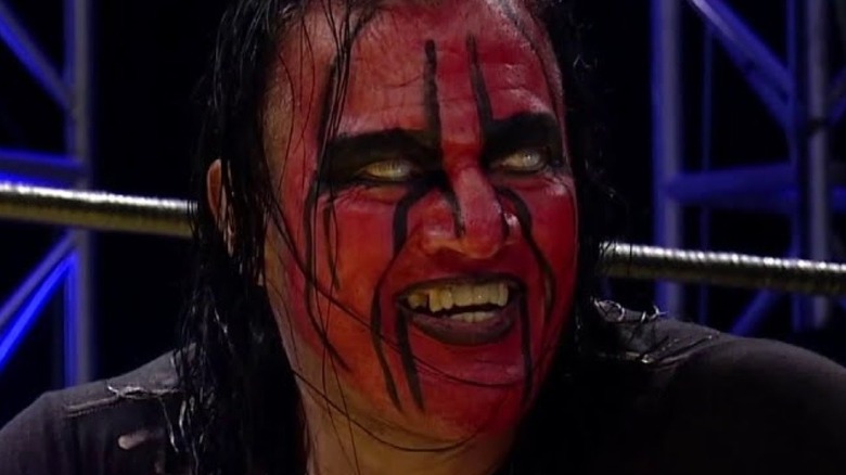 Chessman smiling maniacally