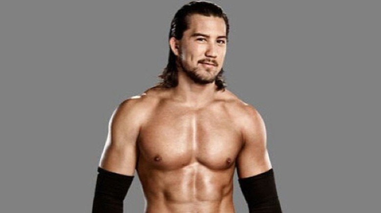 Richie Steamboat poses in his wrestling gear during a backstage photoshoot for WWE.