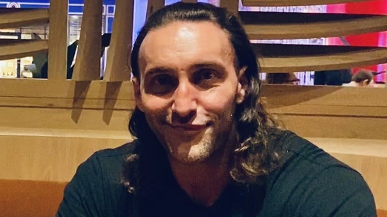 Chris Adonis, with a look on his face that says "yes I tweeted that, what are you going to do about it?"