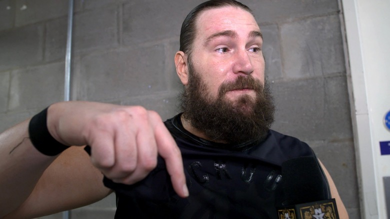 Chris Hero being interviewed backstage in NXT