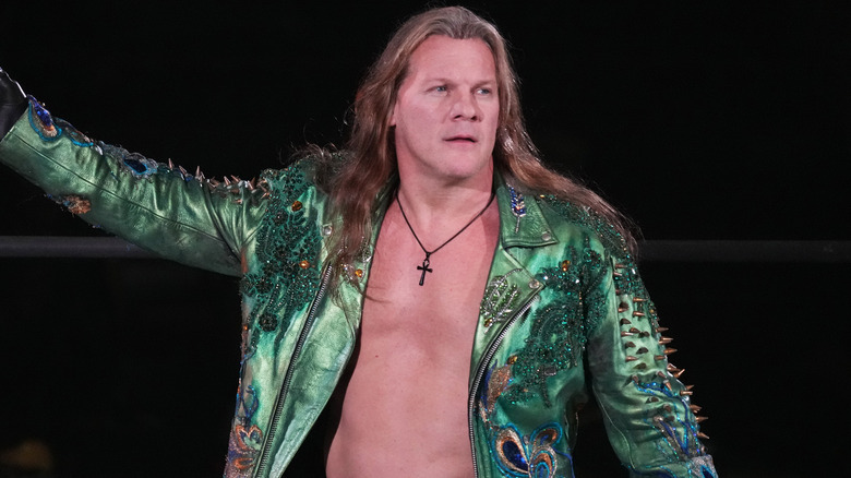 Chris Jericho wearing a green jacket