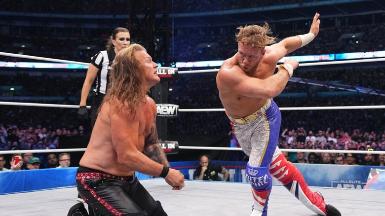 Chris Jericho accepts his fate as Will Ospreay goes to elbow his head off
