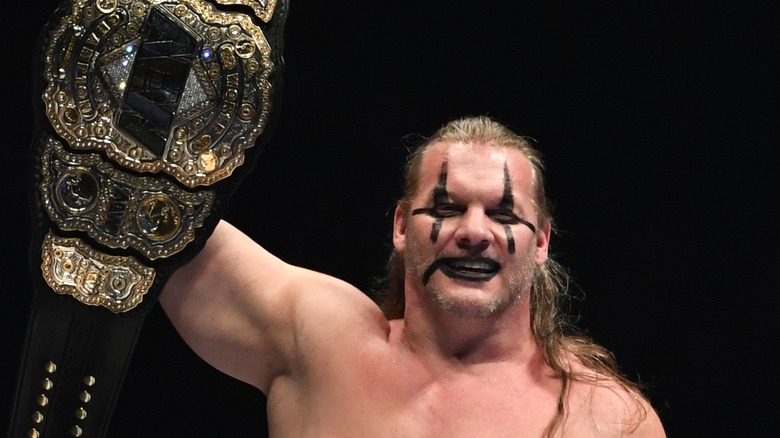 Chris Jericho holding title belt