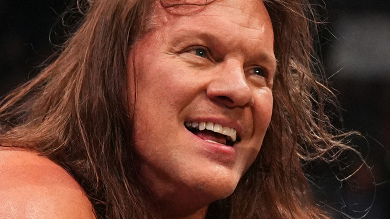 Chris Jericho smiling in an AEW ring 