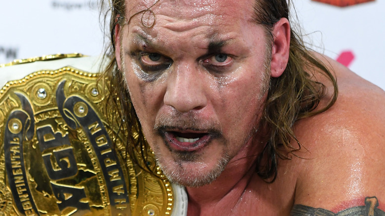 Chris Jericho holds IWGP IC title