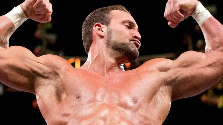 Chris Masters flexing in the ring ahead of a match.