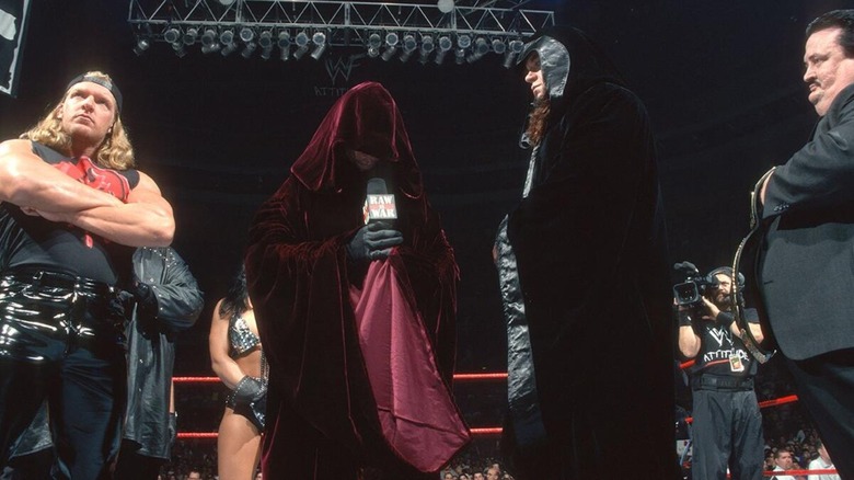 The Ministry of Darkness moments before Vince McMahon revealed himself as 'The Higher Power' who controlled The Undertaker for months.