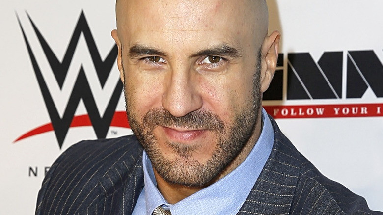 Cesaro in WWE smiling at an event