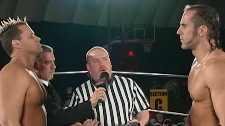 Nigel McGuinness and Claudio Castagnoli starring at each other