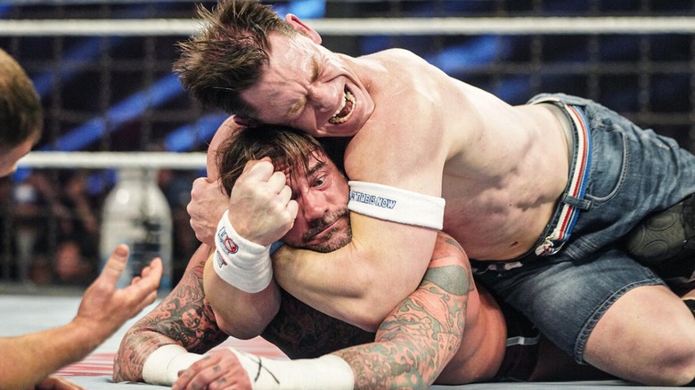 John Cena locking CM Punk into an STFU during their Elimination Chamber 2025 clash.