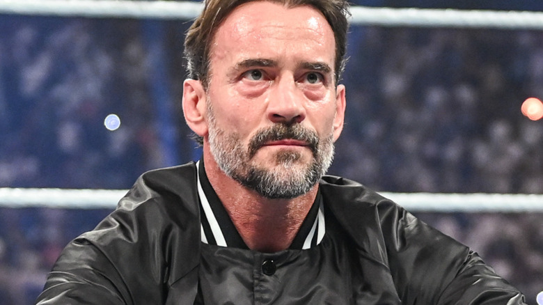 CM punk crossing legs