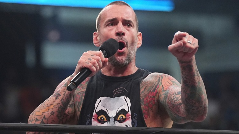 CM Punk speaking and pointing