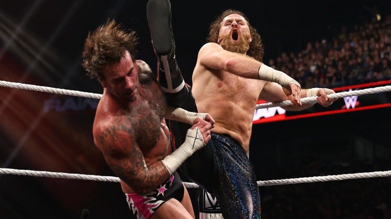 Sami Zayn nails CM Punk with a kick during their match for the Undisputed WWE Championship on the July 6, 2026 edition of "WWE Raw."