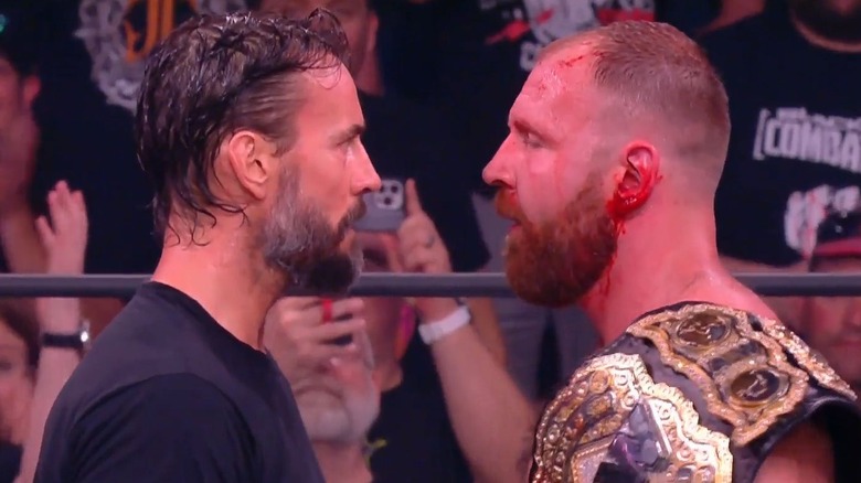 CM Punk and Jon Moxley face off
