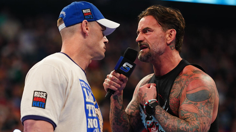 John Cena and CM Punk in the ring