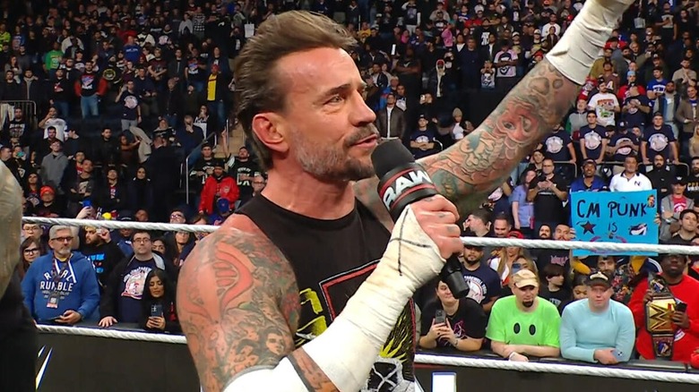 CM Punk addressing the crowd during a promo on 