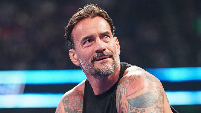 CM Punk looks on during 