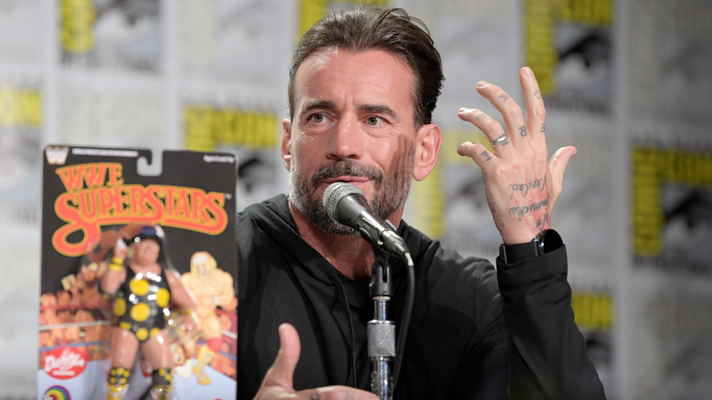 CM Punk gesturing with his hands at San Diego Comic-Con