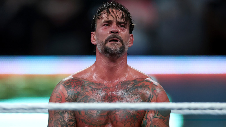 CM Punk sweating inside a wrestling ring