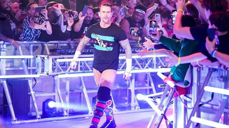 CM Punk heads down the ramp
