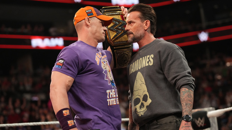 John Cena and CM Punk in the ring