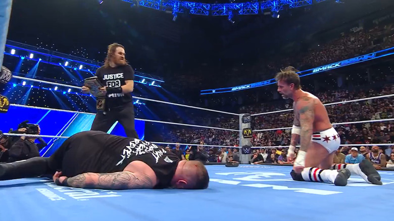 Sami Zayn takes out CM Punk and Kevin Owens in the ring