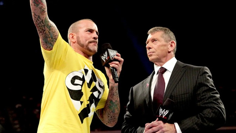 CM Punk and Vince McMahon in WWE