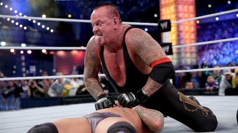 The Undertaker pinning CM Punk to secure the victory at WrestleMania 29.